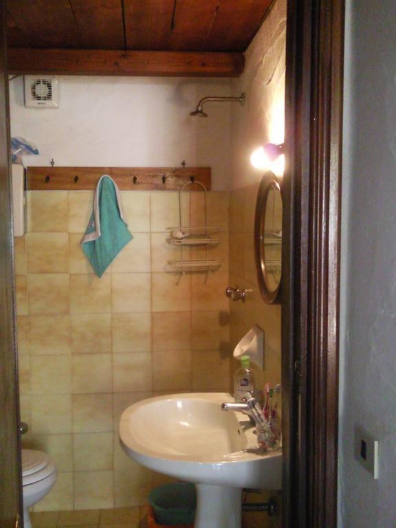 Monolocale San Teodoro Apartment Bilik gambar